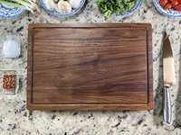 Tabla de cortar de madera de nogal sostenible, nogal negro macizo de 17x12x1.25 pulgadas, reversible con asas y ranura para jugos