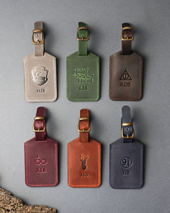 Étiquettes à bagages <span class=keywords><strong>en</strong></span> cuir véritable durables <span class=keywords><strong>en</strong></span> gros avec boucle métallique sécurisée Logo gravé au laser personnalisé - Product Image 1