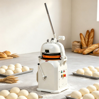 Équipement de boulangerie, diviseur et arrondisseur de pâte pour la fabrication de boules de pâte à pizza