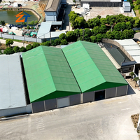 Tente de stockage industrielle robuste verte pour entrepôt, abri de grande capacité avec structure en aluminium, portable pour le stockage de matériaux en usine