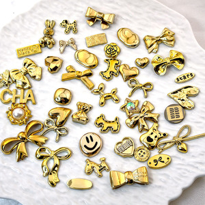 โบว์รูปหัวใจหน้ายิ้มสีทองแบบผสมผสาน วัสดุอุปกรณ์งานฝีมือ DIY สำหรับทำเครื่องประดับ ขนาดกลาง ทำจากพลาสติกเรซิ่น ทำด้วยมือ - Product Image 1