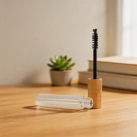 Tube de mascara vide rose mat givré de 10 ml avec brosse volumisante et logo brillant, idéal pour les trousses de maquillage, les sacs à main et les vanités