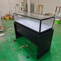 Vitrine de luxe haut de gamme de qualité muséale pour montres, avec éclairage LED, tiroirs de rangement, comptoir de vente de boutique et table de présentation en verre