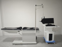 Dispositif de traction lombaire électrique de thérapie médicale physique et lit de table de traction