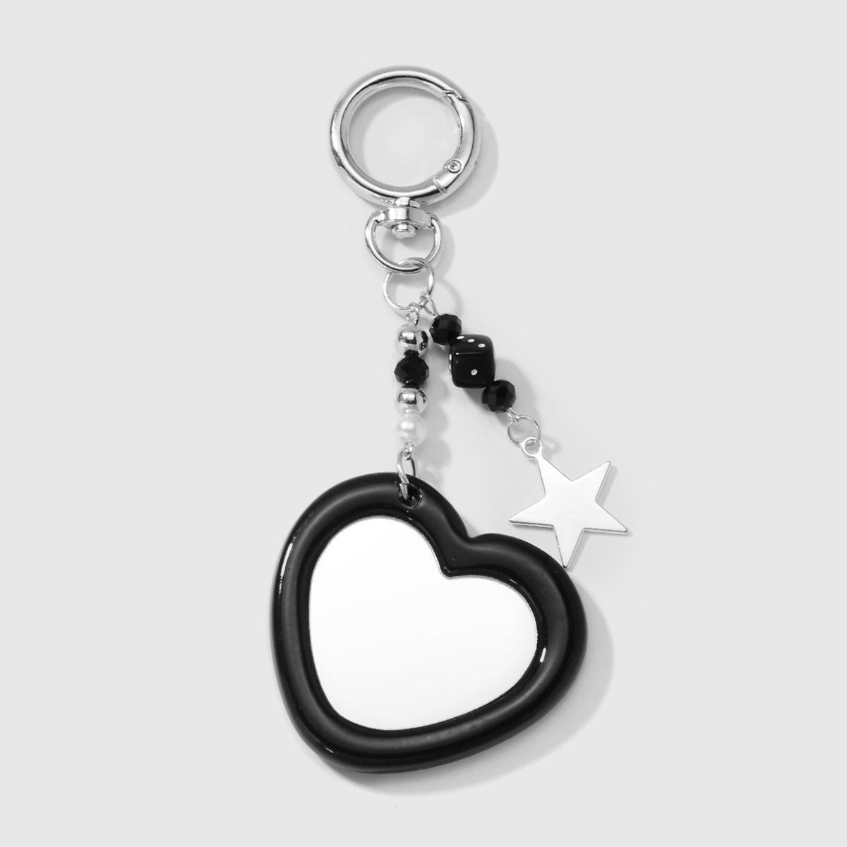 Porte-clés miroir d'amour noir 1