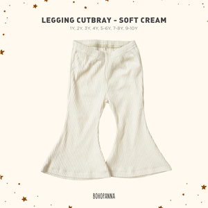 Pantalones elegantes de tela suave color crema, hechos con tela transpirable de primera calidad, suavidad agradable y comodidad duradera para niños pequeños activos. - Product Image 1