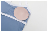 Ensemble de yoga pour femme : débardeur et short, couleur nude, blocs de couleur, dos croisé, haute élasticité, vêtements de sport, vente en gros, logo personnalisé