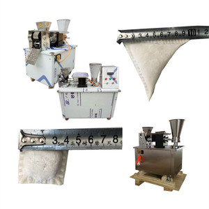 Machine professionnelle de fabrication de wontons, de rouleaux de printemps et de gyozas fourrés à la viande - Product Image 1