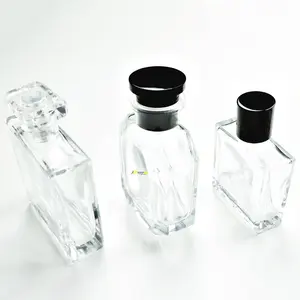Muestra gratis lujo mujer 30ml 50ml 100mL botella de perfume de vidrio en aerosol cuadrado 50ML botellas de perfume al por mayor