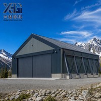 Hangar préfabriqué en structure métallique pour aérodrome montagneux, bâtiment métallique résistant aux vents et aux neiges pour l'aviation en haute altitude