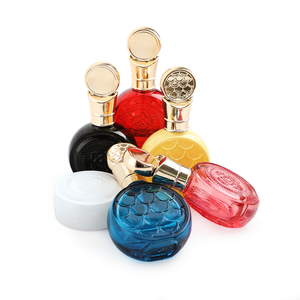 Vente <span class=keywords><strong>en</strong></span> <span class=keywords><strong>gros</strong></span> de flacons de parfum ronds <span class=keywords><strong>en</strong></span> verre personnalisés de 50 ml, emballages de parfum vides colorés avec bouchon doré - Product Image 2