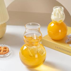 Bouteille <span class=keywords><strong>en</strong></span> <span class=keywords><strong>verre</strong></span> borosilicate <span class=keywords><strong>en</strong></span> forme de <span class=keywords><strong>gourde</strong></span> créative, pichet résistant à la chaleur pour le <span class=keywords><strong>thé</strong></span> infusé à froid, les cocktails, le café glacé - Product Image 1