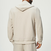 Sweat à capuche gaufré pour homme avec poche kangourou et poignets côtelés, pull décontracté d'automne, style urbain et extérieur, vente en gros personnalisée