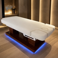 Lit de massage électrique de luxe moderne à 4 moteurs, réglable, pour soins esthétiques, spa médical, et soins du visage et cosmétiques