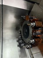 TCK-52MYC Twin Spindle 3-Axis CNC Turning Center dengan Kapasitas Batang 52mm untuk Bagian Logam Presisi Kompleks.