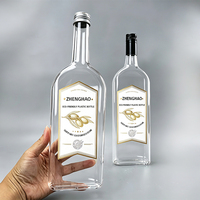 Fabrication en gros de bouteilles en plastique PETG transparentes vides de 750 ml pour boissons, jus, vin, liquides