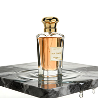 Flacon pulvérisateur de parfum de luxe transparent en gros, 50 ml, 75 ml, vide, en verre noir avec capuchon en alliage de zinc et boîte