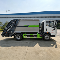 Camion compacteur de déchets puissant Sinotruk HOWO 8CBM avec structure de chargement arrière pour la collecte et l'expédition de déchets industriels