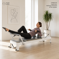 Machine de Pilates Reformer JOYFIT blanche pour usage domestique, cadre en aluminium de qualité studio, barre de pieds réglable, lit de Pilates à résistance par ressort