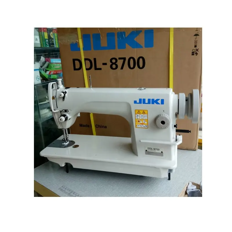 Machine à coudre industrielle à aiguille unique JUKIS DDL 8700 d'occasion