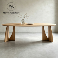Table à manger ovale contemporaine nordique en chêne pour 6 à 8 personnes, ensemble table et chaises pour villa et maison d'hôtes, mobilier nordique