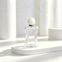 Flacon de parfum vide en verre transparent de luxe 50 ml et 100 ml avec bouchon à vis, conception de logo personnalisé, marquage à chaud, emballage personnalisé
