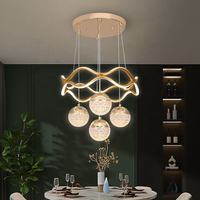 Luz creativa cálida para sala de estar, pantalla acrílica LED, anillos de círculo dorado, luz colgante