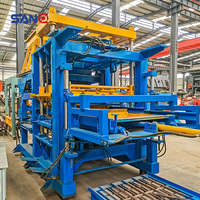 Production de 20000 blocs par jour Machine de fabrication de briques QT10-15 blocs de pavage colorés Machine de fabrication de blocs de béton