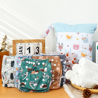 Couches pour bébé 13 pièces best-seller Ensemble cadeau Couches multifonctionnelles Sac humide et couches lavables de poche