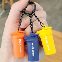 Kualitas tinggi disesuaikan Mini kebugaran Gym aksesoris olahraga botol gantungan kunci Carabiner Logo dicetak karet ramah lingkungan tahan lama