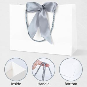 ถุงกระดาษของขวัญพิมพ์ลายตามสั่ง ถุงกระดาษช้อปปิ้งสุดหรู ขายส่ง พร้อมโลโก้ของคุณเอง สำหรับธุรกิจเสื้อผ้า - Product Image 4