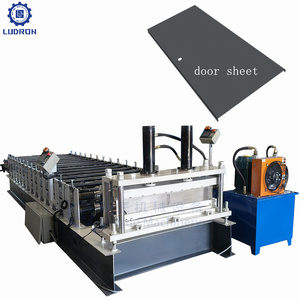 เครื่องขึ้นรูปแผงประตูเหล็กอัตโนมัติ เครื่องขึ้นรูปแผงประตูเหล็กสำหรับอุตสาหกรรม เครื่องรีดขึ้นรูปแผงประตูเหล็ก - Product Image 2