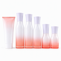 Flacons cosmétiques en verre rose dégradé avec bouchon et applicateur, emballage moderne pour usage industriel