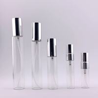 Flacon de parfum en verre cylindrique de petite taille prêt à l'emploi avec pulvérisateur à pompe, tailles 3 ml/5 ml/10 ml, emballage en boîte noire/blanche pour sérum de soin de la peau