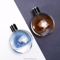Flacon de parfum de luxe personnalisé en usine, best-seller, flacon de parfum vide de haute qualité, flacon pulvérisateur de parfum, flacon en verre de 100 ml