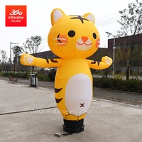 Danseur aérien gonflable en forme de tigre, bras extensible vers le haut, danseur aérien gonflable de dessin animé