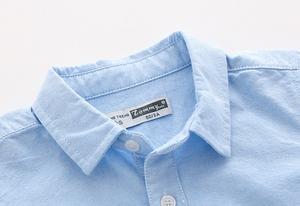 Achetez directement auprès du fabricant chinois de nouvelles chemises polo amusantes pour enfants en coton Oxford à blocs de couleur et à manches raglan. - Product Image 3