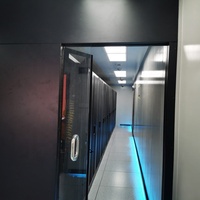 Solution clé en main : infrastructure de centre de données modulaire avec refroidissement en-rangée de 20 pieds pour cluster de formation GPU