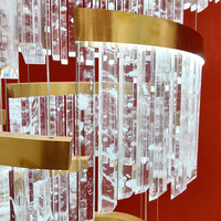 Lustre suspendu en cristal en spirale à plusieurs niveaux, personnalisé et luxueux, lampe suspendue circulaire moderne pour plafond haut, décoration de villa et d'hôtel