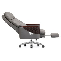 Chaise de bureau de direction en cuir véritable de luxe personnalisée avec dossier inclinable et cadre métallique pivotant réglable