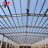 Hangar industriel préfabriqué, atelier d'usine, structure en acier à grande portée, entrepôt, bâtiment