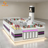 Comptoir de bar à parfums en MDF blanc de luxe, écologique, avec logo rétroéclairé, design de magasin pour petite boutique de cosmétiques