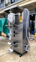 Ligne de production complète automatique de remplissage et d'emballage de sachets d'eau pure liquide 2000 bph