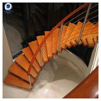 Escalier en colimaçon intérieur de luxe avec garde-corps en verre sans cadre pour hôtel