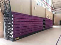 Gradins rétractables Sièges de gymnastique Gradins télescopiques électriques Banquette pour terrain de sport intérieur