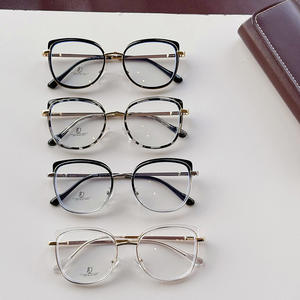 Montura de gafas Qianai Cat Eye TR90 con patillas de resorte, anti luz azul, para mujer, montura completa, lentes AC, diseño irregular - Product Image 1