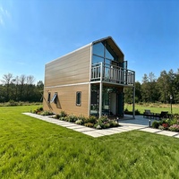 Maisonnette moderne de luxe, préfabriquée, portable, modulaire, en conteneur, pour une vie de villégiature.