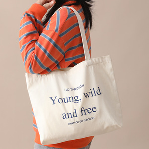 Grand sac fourre-tout en toile rayée avec citation inspirante, en coton écologique, idéal pour les étudiants, les trajets quotidiens et le shopping - Product Image 1