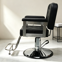 Fauteuil de barbier classique noir robuste, hydraulique, inclinable et pivotant, avec repose-pieds et appui-tête, pour salon de coiffure masculin