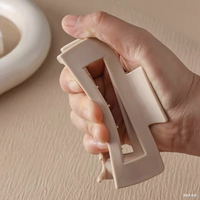 Pince à cheveux personnalisée en caoutchouc, silicone et plastique, durable et souple, avec protection anti-choc pour la tête